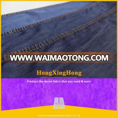 Wholesale large quantity supplier Plain pure 100% Tencel cotton denim fabric for jean garment